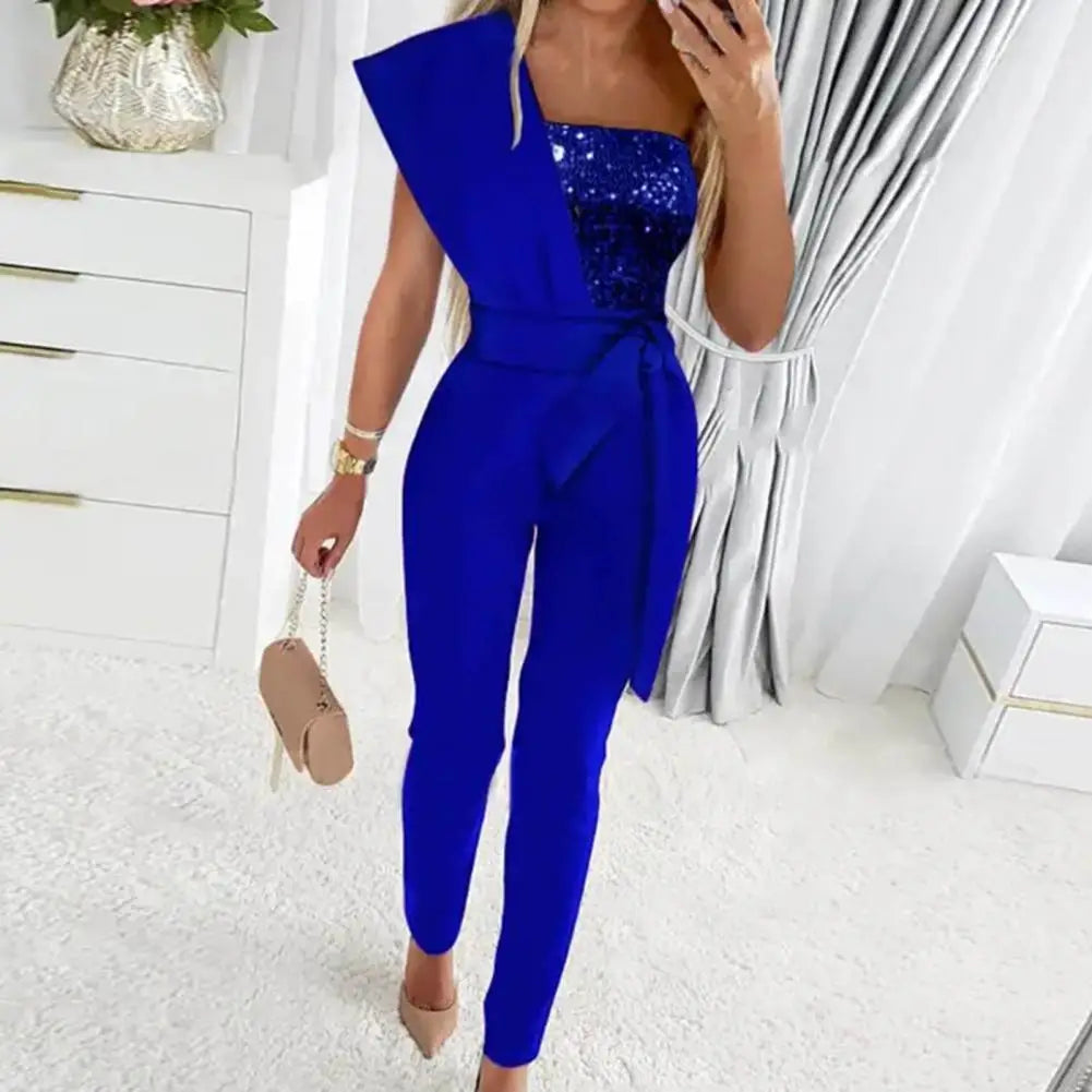 Zalicia - Jumpsuit mit Patchwork und funkelnden Pailletten