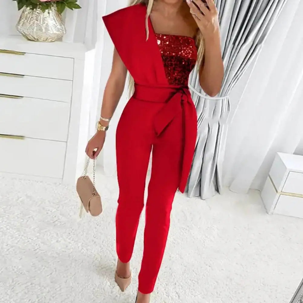 Zalicia - Jumpsuit mit Patchwork und funkelnden Pailletten