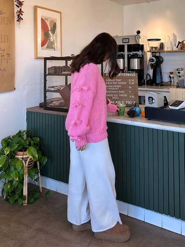 Rosa Strickpullover mit 3D-Schleifen – Elegante Oversize Streetwear für Damen - Neslin