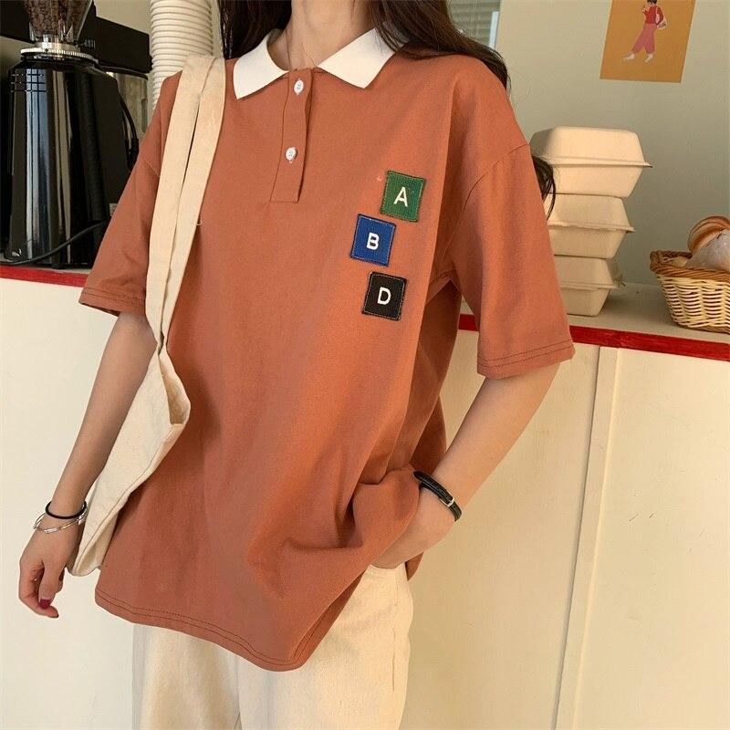 Damen-Poloshirt mit Patches