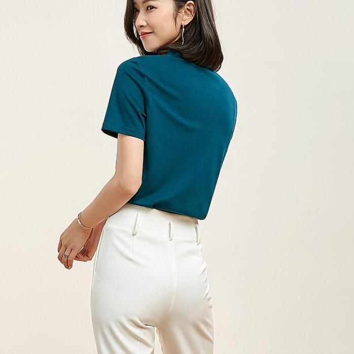 Damen-Poloshirt mit graphischem Aufnäher
