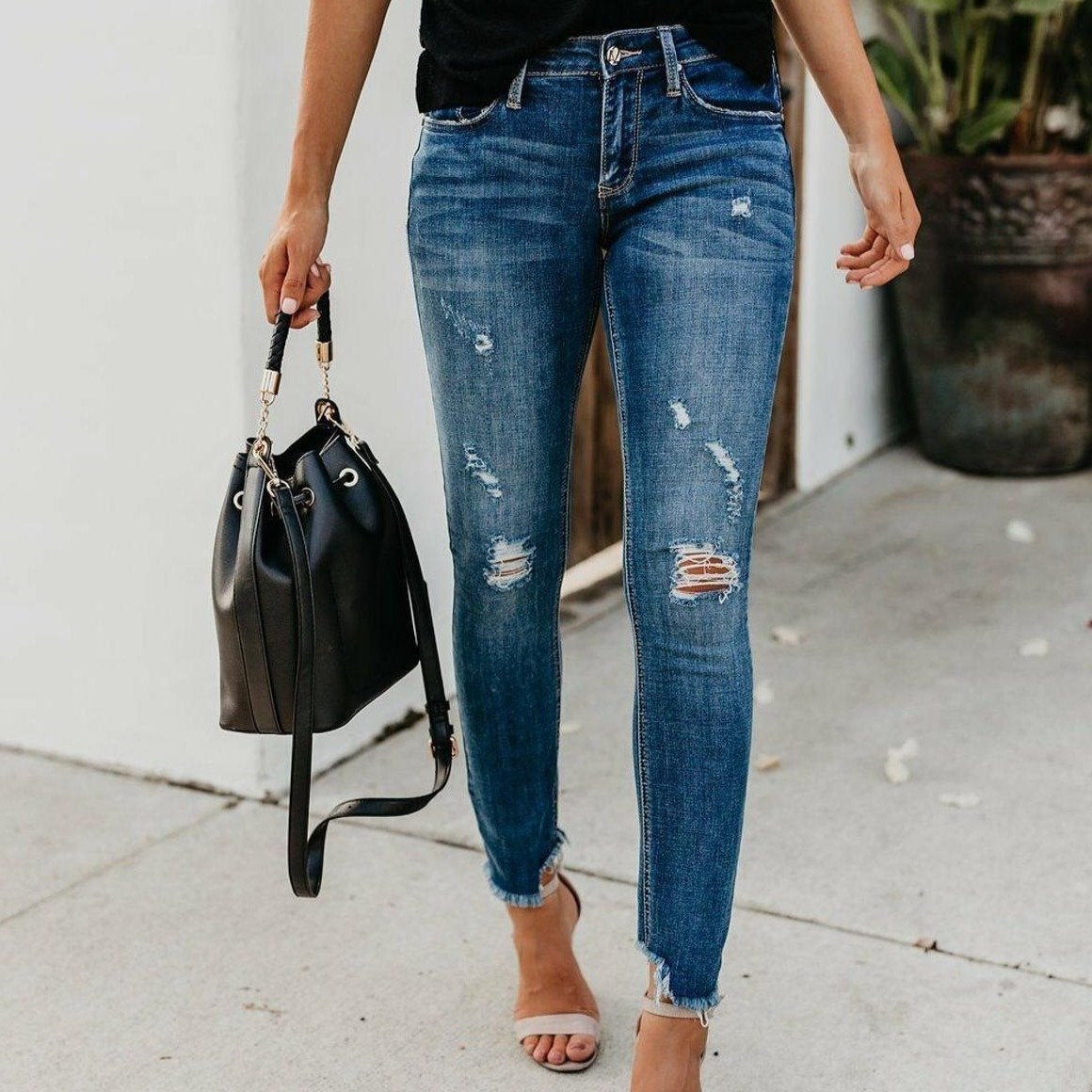 Damenjeans mit Abreibungen